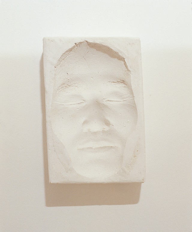 1988-1(마스크-음각) · installation, plaster, stone , 1kg · 1988 · 김영진 · Kim Youngjin · (이미지 출처 = 대구미술관) · (Source = Daegu Art Museum)